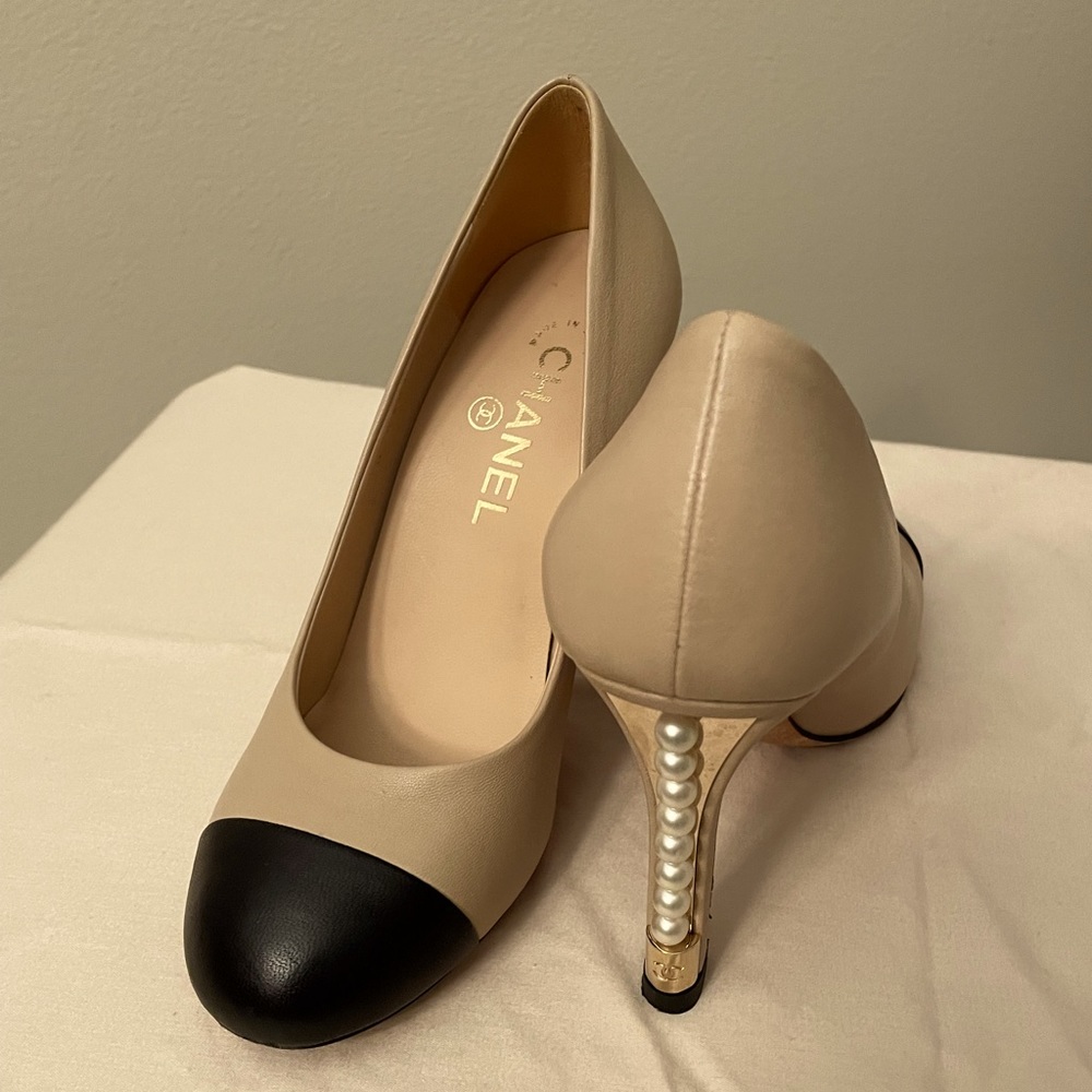 CHANEL heels Nude with black toe, pearls line the heel. BEAUTIFUL!!!! SZ 37